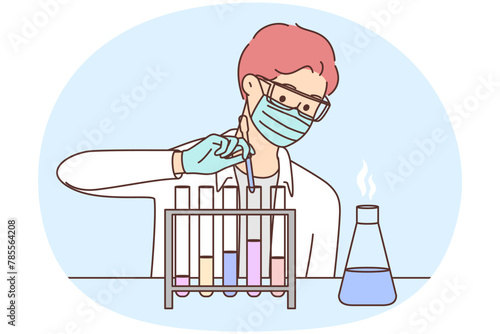 Male scientist make experiments in lab