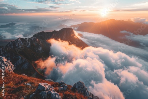 Mountaintop View Overlooking a Valley Filled With Clouds at Dawn photo