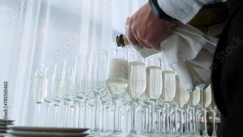 person holding a glass of champagne