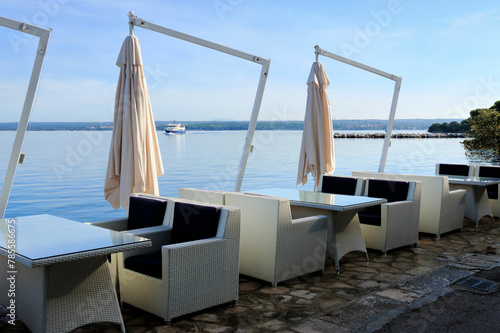 blue and white chairs in National park Brioni, Croatia