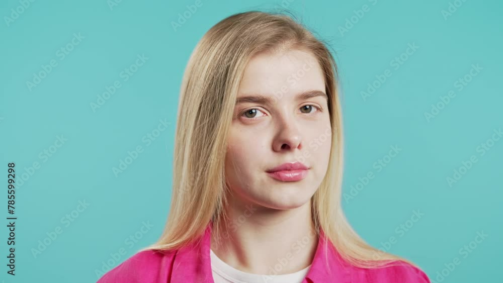 Young pretty teenager girl disapproving signal with no head, nods rejectingly. Young pretty teenager girl disapproving signal with no head, nods rejectingly.