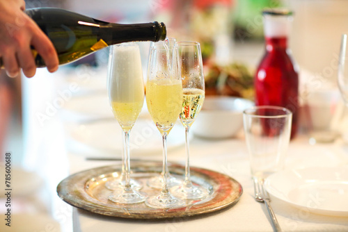 Champagne glasses and bottle in restaurant © Dasha Petrenko