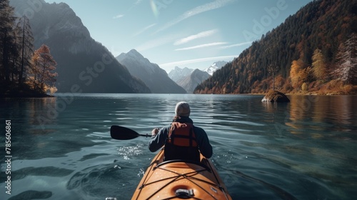 Person Kayaking on Lake