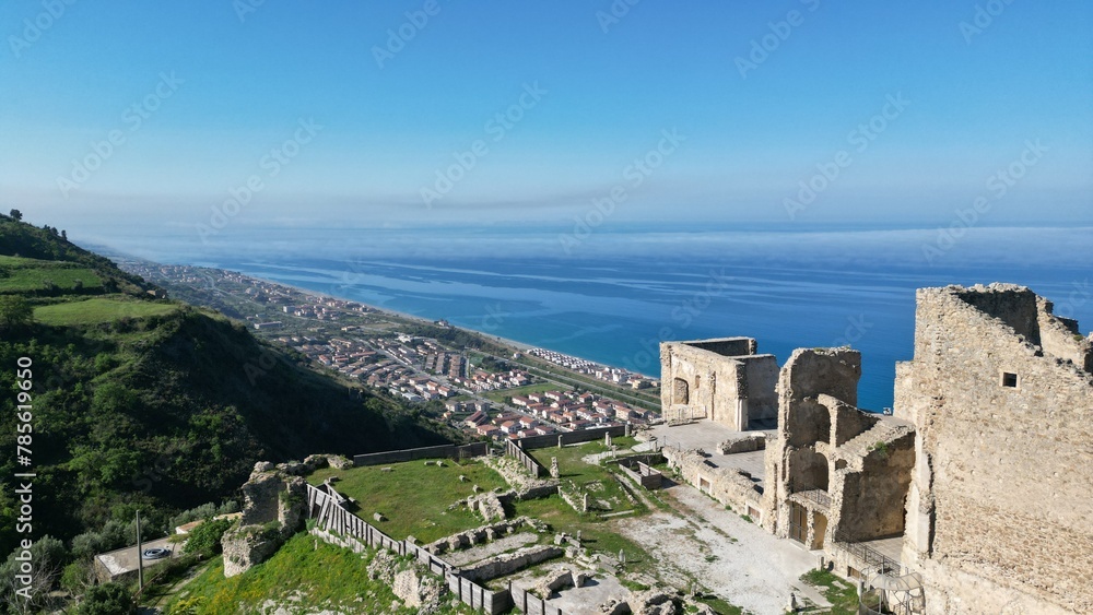 Scenic aerial view of Fiumefreddo Bruzio (one of Italy’s Most Beautiful Villages) on mountain hill top above Tyrrhenian sea coast, province of Cosenza, Calabria, Italy.