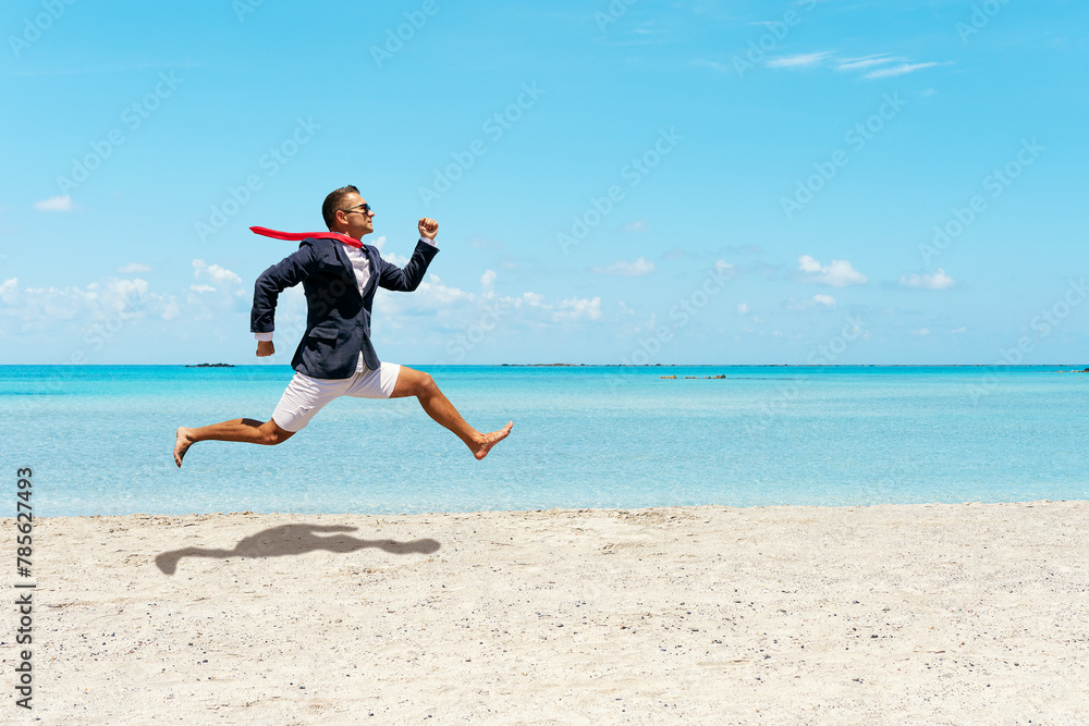 Happy businessman running away from office work on the beach. Happy businessman running away from office work on the beach.