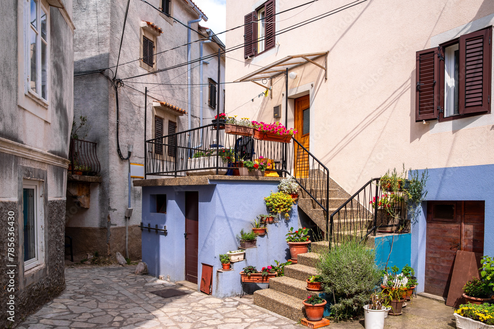 Traditional alley with buildings in Vrbnik, on the island of Krk, Croatia