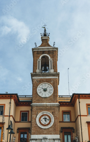 old town hall clock tower in downtown rimini city