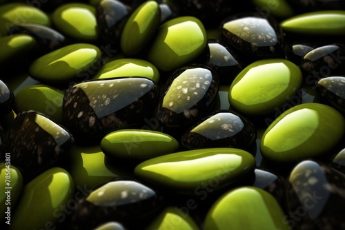 A pile of black and green rocks on a black background. 3d rendering. High quality photo