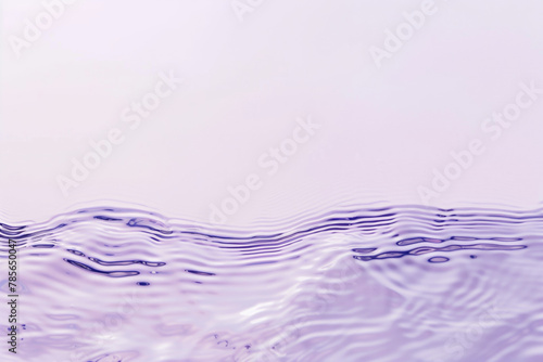 Flat lay water texture ripple pastel lilac background. Spa  cosmetics or summer concept