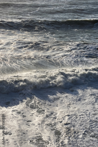 Waves and foam surface, stormy Pacific ocean
