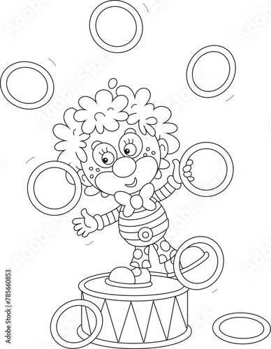 Funny red circus clown balancing on a big drum and juggling with toy hoops in a fun performance, black and white vector cartoon illustration for a coloring book © Alexey Bannykh