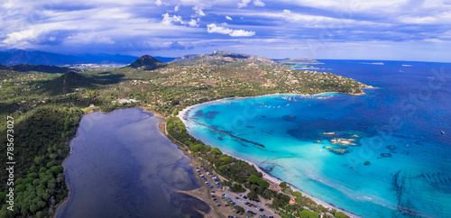 Best beaches of Corsica island - aerial video of beautiful Santa Giulia long beach with sault lake from one side and turquoise sea from other