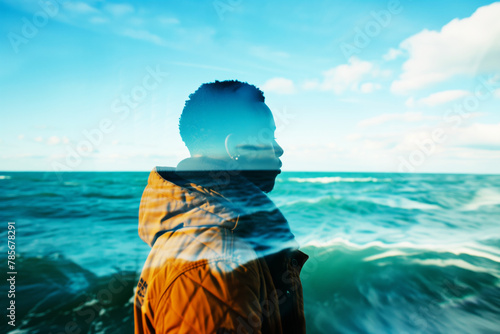 Contemplative figure with seascape double exposure. Generative AI image photo