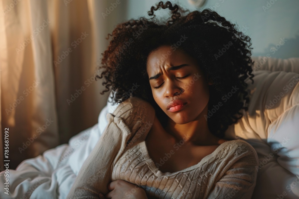 Woman with menstrual cramps, hugging her abdomen, soft lighting, visible discomfort 01 Woman with menstrual cramps, hugging her abdomen, soft lighting, visible discomfort 01