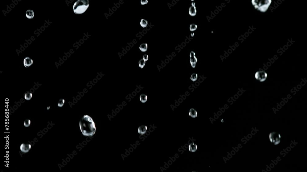 Super Slow Motion Shot of Water Shower. Filmed on High Speed Cinematic Camera at 1000 Frames per Second Super Slow Motion Shot of Water Shower. Filmed on High Speed Cinematic Camera at 1000 Frames per Second
