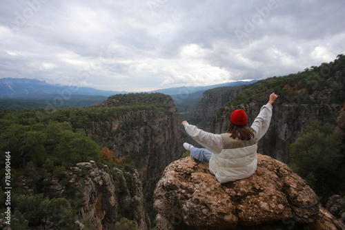 person on top of the mountain