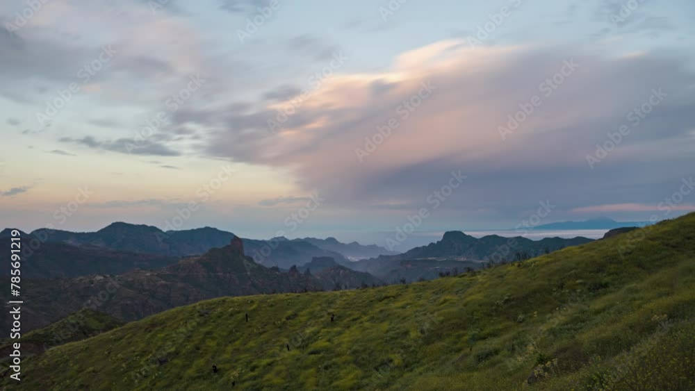 Night to day time lapse, moonlight on Roque Bentayga and volcanic caldera of Tejeda, Gran Canaria, Canary islands, Spain. Night to day time lapse, moonlight on Roque Bentayga and volcanic caldera of Tejeda, Gran Canaria, Canary islands, Spain.