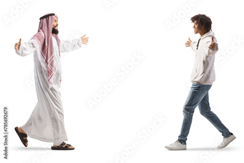 Full length profile shot of a saudi arab man meeting a young african american man