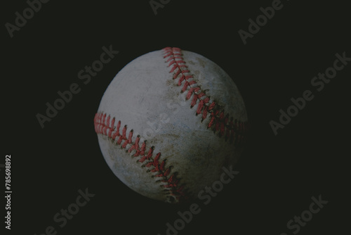 Mysterious darkness over used old baseball ball for sport background.