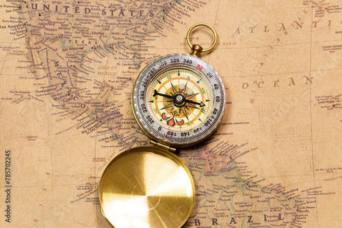 Retro vintage compass with vintage map
