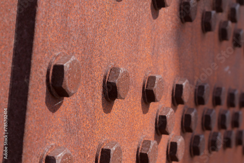bolts screwed on steel plates