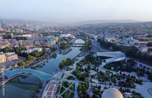 Amazing Drone panorama of Tbilisi with Rike park, bridge of Peace and Kura river and Public Service Hall- House of Justice