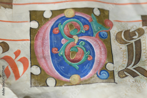 Detail with initial letter from illuminated antiphonary manuscrip photo