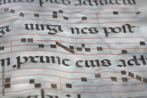 Detail with musical notation from illuminated antiphonary manuscript f photo