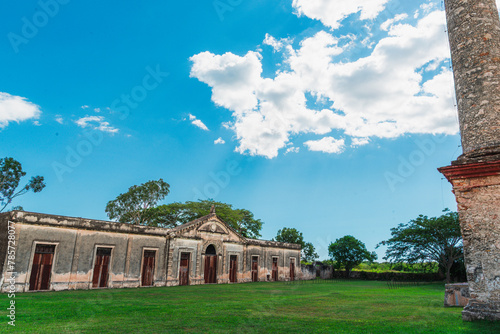 Majestic Yaxcopoil Hacienda under a Cloudy Sky photo