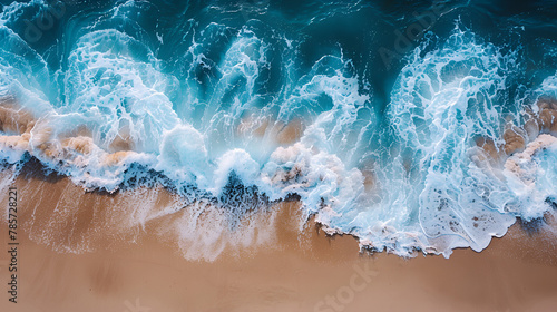An aerial view of a sandy beach with azure waves, Stormy Beauty Ocean Waves on the Beach as a Stunning Background  © sanjaykhan