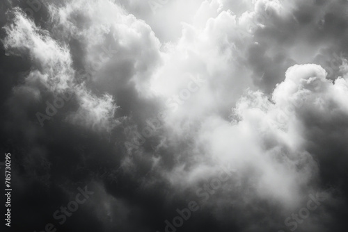 Sun Rays Peeking Through Dramatic Storm Clouds in a Monochromatic Sky