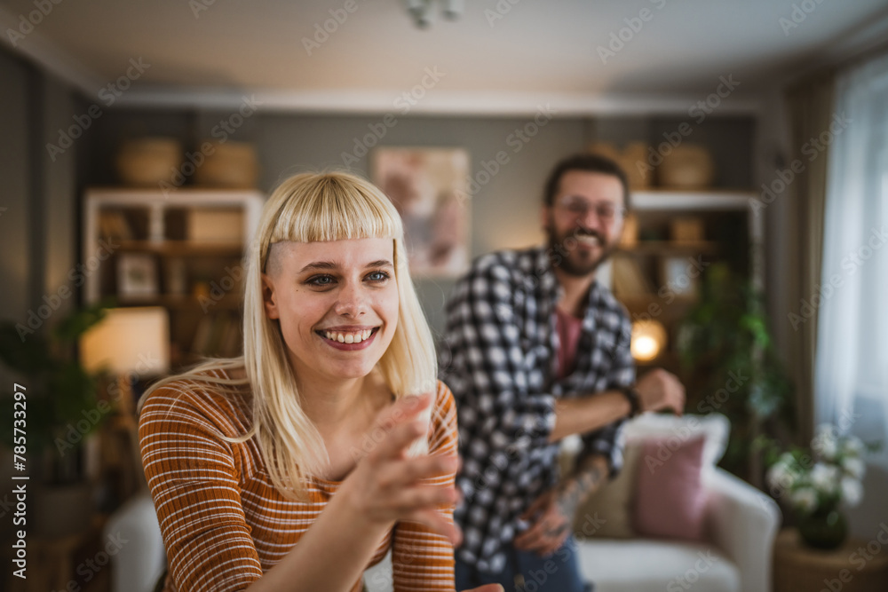 One adult woman dance and have fun at living room at home One adult woman dance and have fun at living room at home
