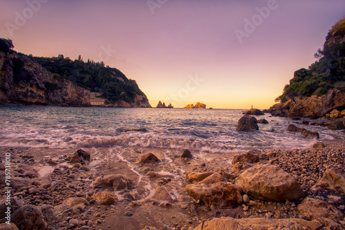 fantastic morning view on pebble beach Ampelaki near Paleokastritsa monastery and Agios Pavlos beach, Corfu island, Europe ...exclusive - this image is sold only Adobe stock 