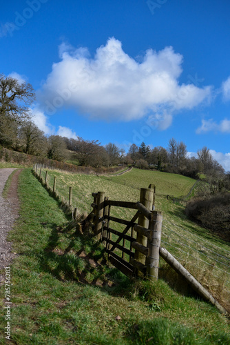 fence on a hill along the footpath for hiking