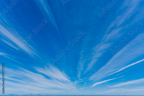sky with cirrus clouds or clouds with fine filaments and radial composition