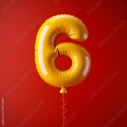 ballon with the number six in yellow over a red background