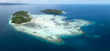 The islands of Friwin and Friwin Bonda, in Raja Ampat, are surrounded by beautiful coral reefs. The area supports the greatest marine biodiversity known on Earth.