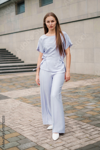 female in grey dress outdoors