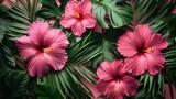 tropical leaf background with green and pink color decoration