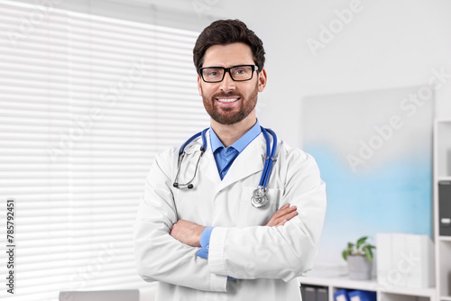 Medical consultant with glasses and stethoscope in clinic