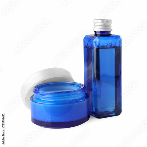 Jar and bottle of cosmetic products isolated on white