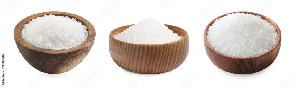 Natural salt in wooden bowls isolated on white, set Natural salt in wooden bowls isolated on white, set