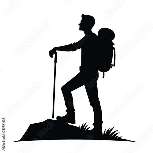 silhouette of a hiker pausing to admire the view
