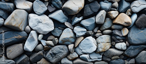Background of pebble stones. Texture of stone wall background. photo
