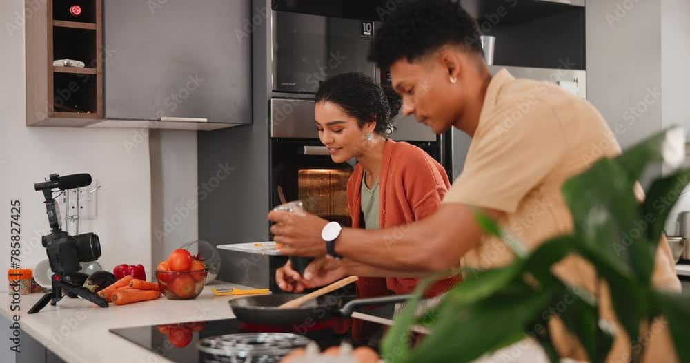 Cooking, influencer and couple in kitchen with camera for live streaming, content creation and diet advice. Healthy food, streamer man and woman in home for broadcast, photography and online tutorial Cooking, influencer and couple in kitchen with camera for live streaming, content creation and diet advice. Healthy food, streamer man and woman in home for broadcast, photography and online tutorial