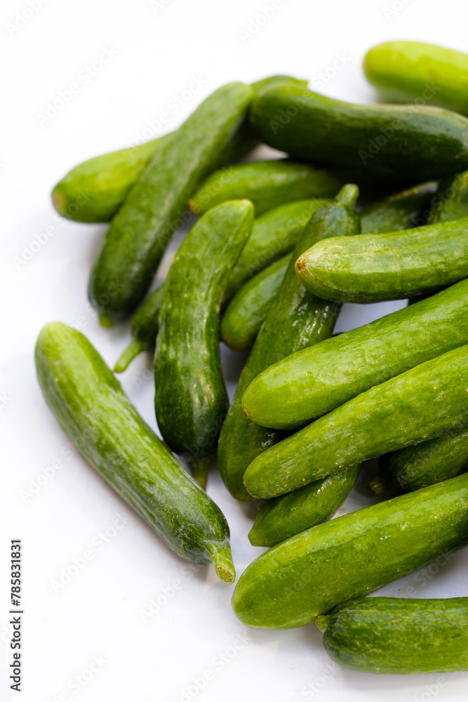 Mini cucumbers on white background. Mini cucumbers on white background.