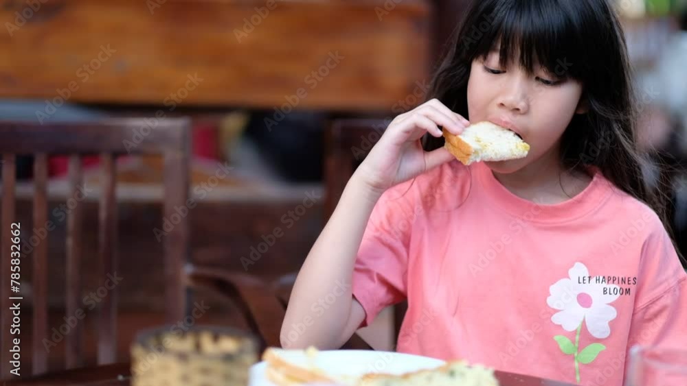 Little girl have breakfast, happy time
Little girl have breakfast, happy time
