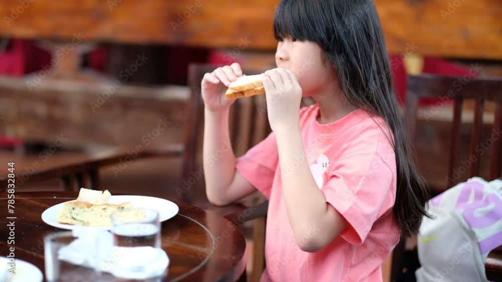 Little girl have breakfast, happy time
Little girl have breakfast, happy time