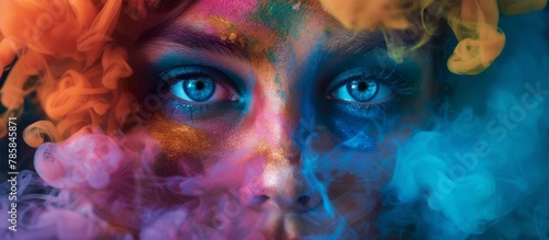 Blue-eyed woman with a colorful hairstyle confidently stares into the camera photo