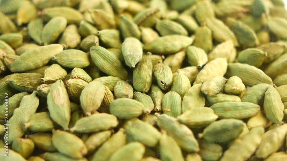 slow motion of Cardamom dropping on table slow motion of Cardamom dropping on table